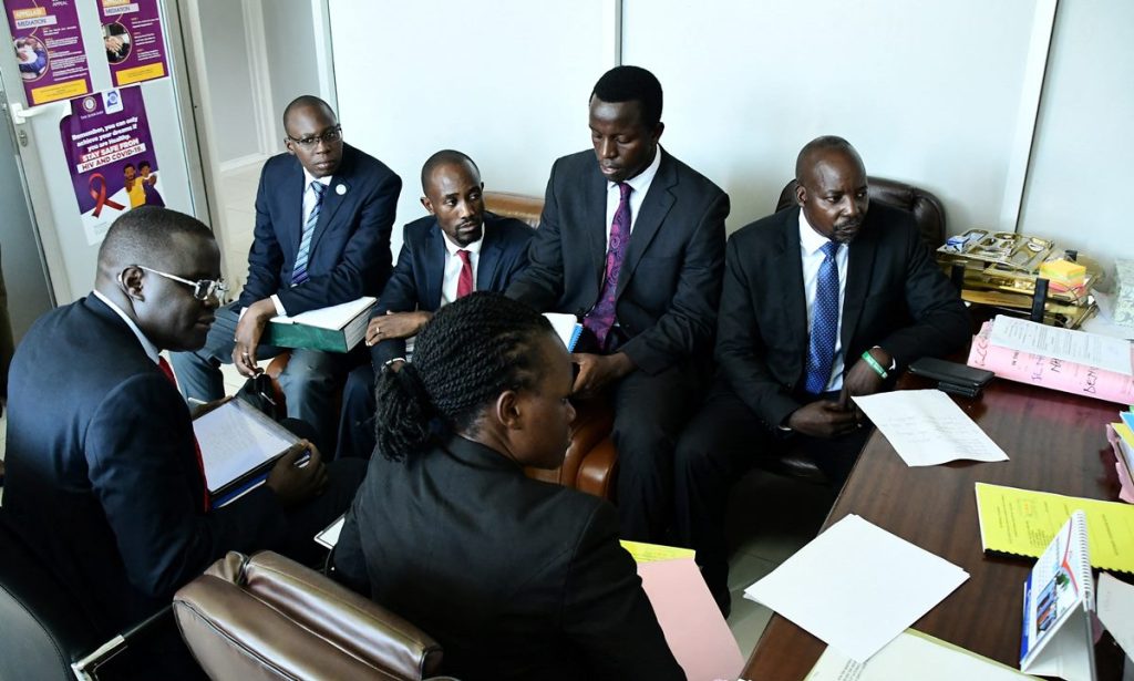 Human Rights Lawyer Nicholas Opiyo Sits With Ugandan Lawyers Inside The Registrar's Chambers To File A Petition Against The Anti Gay Law At The Constitutional Court In Kampala